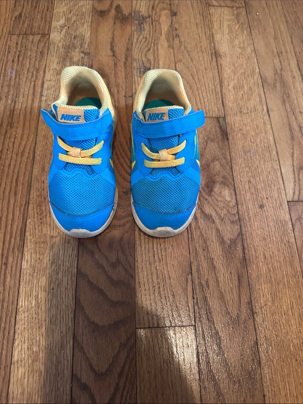Nike Kids Blue and Yellow Velcro Sneakers